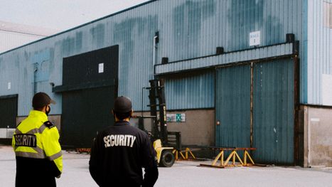 security officers outside warehouse