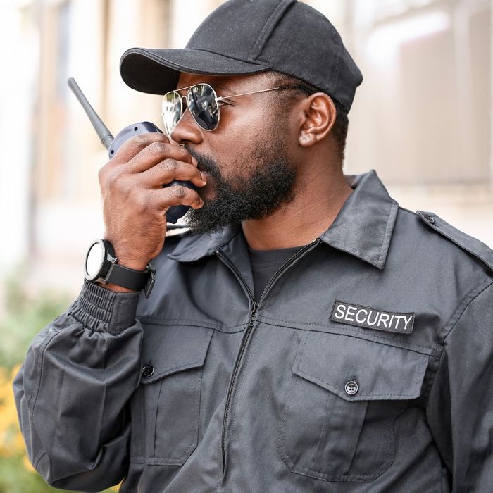 security guard using radio