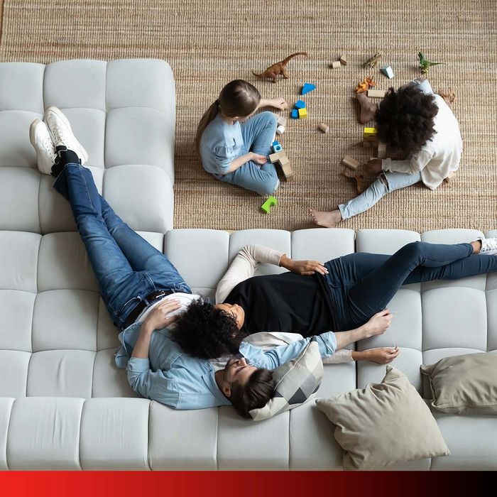 comfortable family on couch in living room