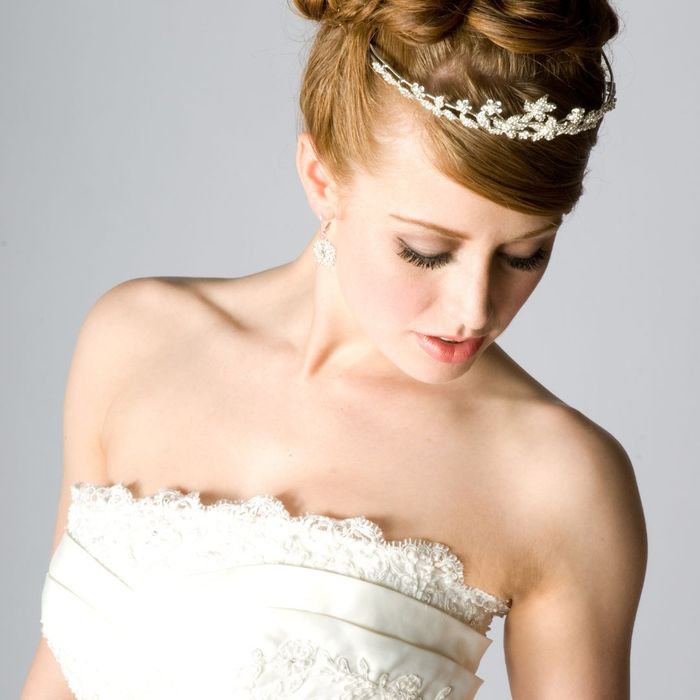 bride in white dress wearing a tiara