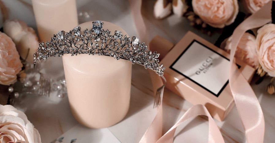 A tiara, flowers and other bridal accessories