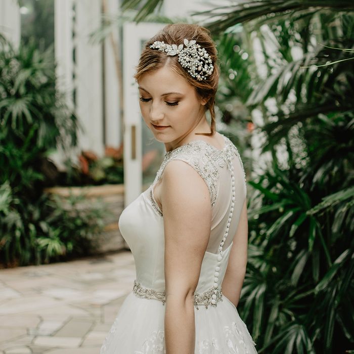 A bride with a multi-textured dress and tiara