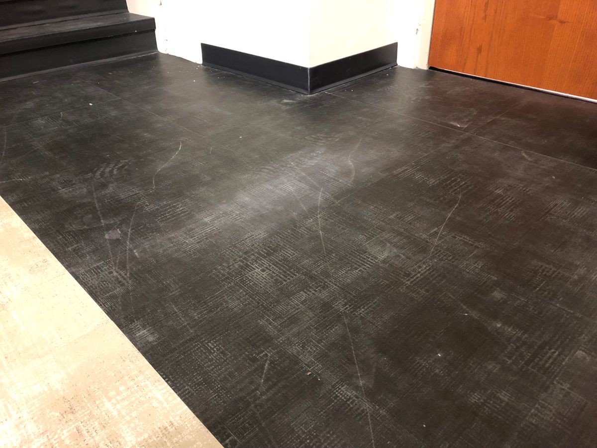 Worn Commercial Resilient Floor