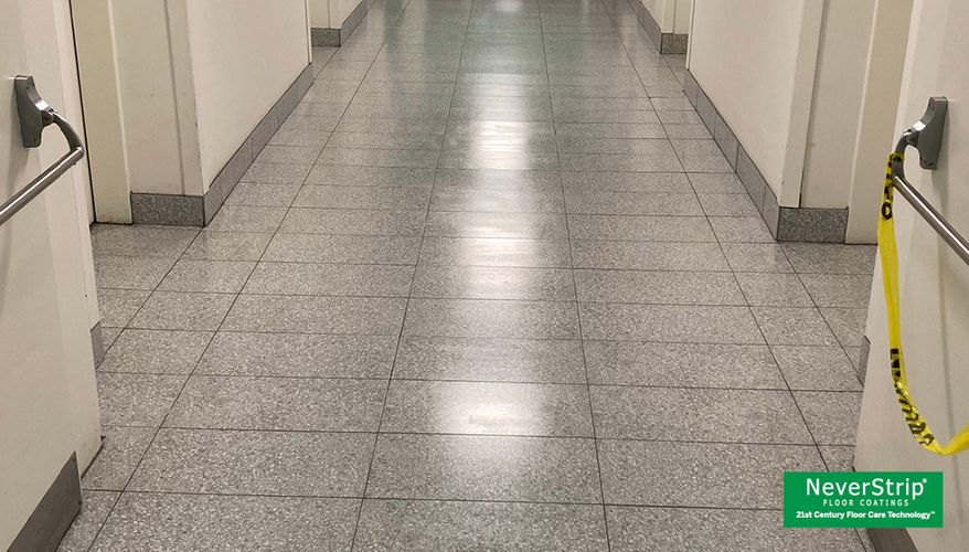 School hallway floors protected with NeverStrip Micron Sealer system for low-maintenance, no-strip floor care. school hallway lvt floor neverstrip micron sealer
