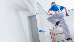 man painting house interior man painting house interior