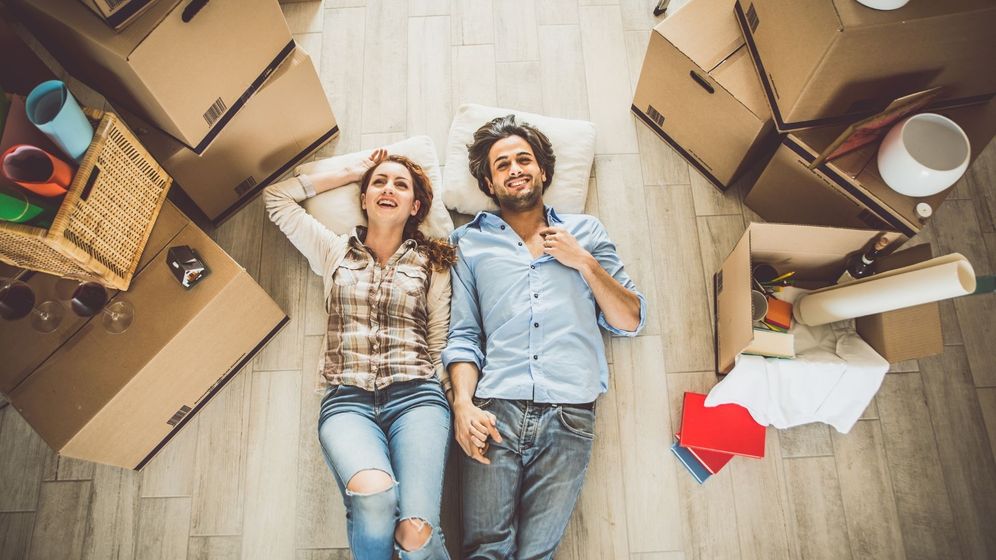 people in their new apartment with boxes to unpack people in their new apartment with boxes to unpack