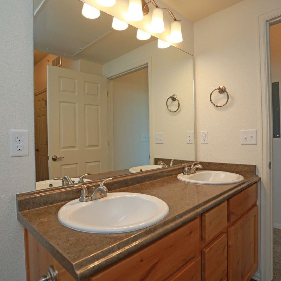 Picture of a bathroom with double sinks from Fossil Ridge Apartments
