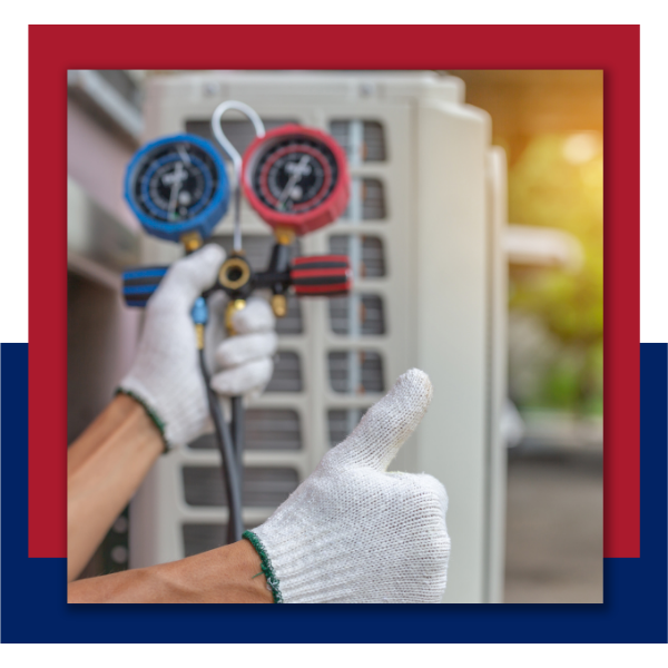 A close-up of a technician's hands wearing white work gloves, holding HVAC manifold gauges with a "thumbs up" gesture in front of an outdoor AC unit.
