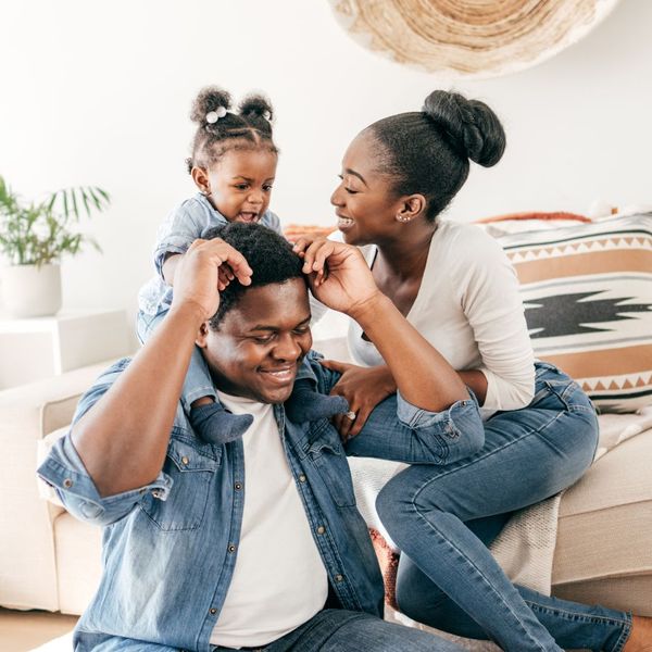 parents and daughter having fun