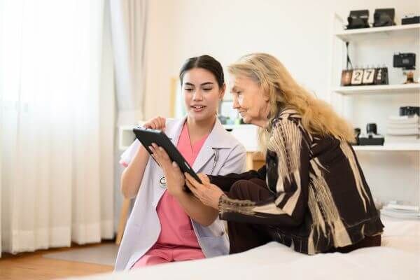 elder care nurse and patient