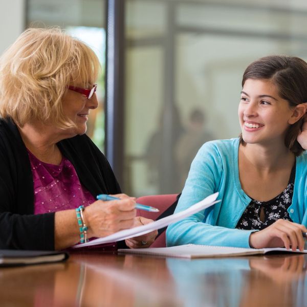 counselor talking to smiling client