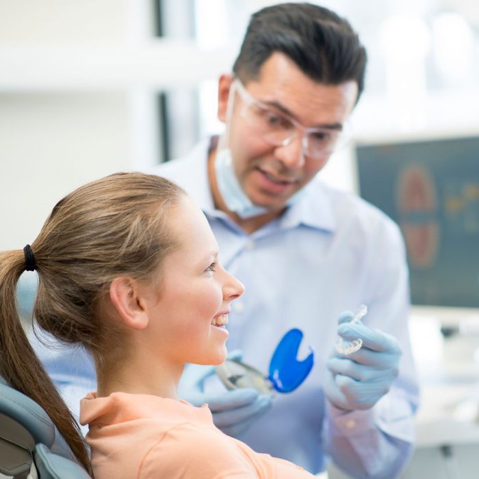 patient consulting dentist about invisalign