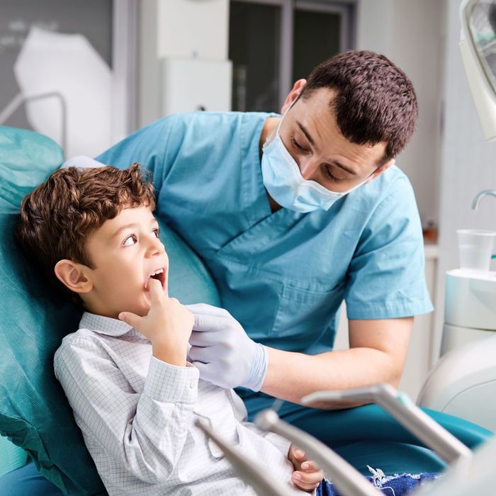 dentist with child patient