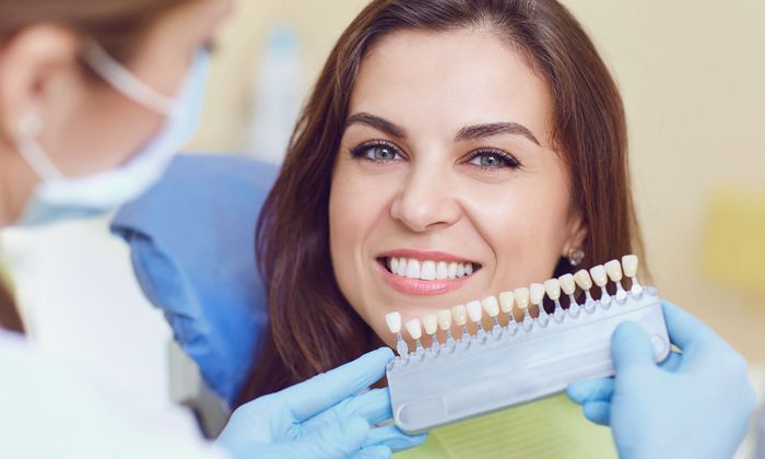 woman smiling with dentist 