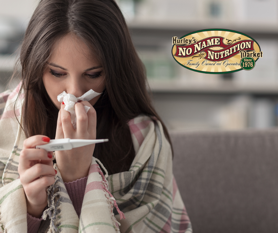 Image of a woman with tissue and a thermometer