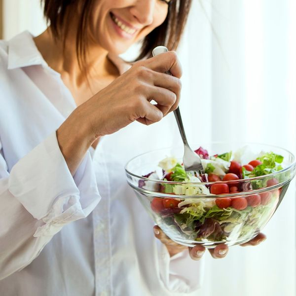woman eating healthy salad