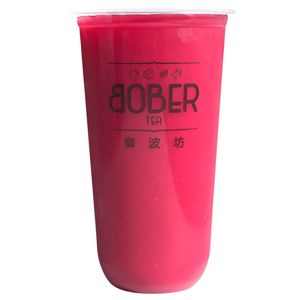 A vibrant, magenta-colored Pink Prickly Pear Green Tea. This bold, refreshing fruit tea is served in a signature Bober Tea cup with a clean, minimalist presentation.