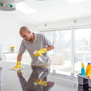 Man cleaning the kitchen