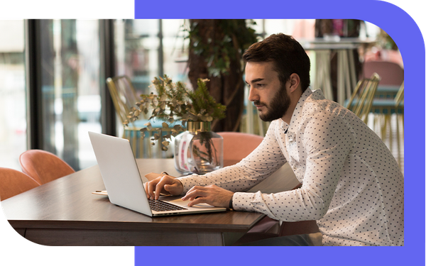 image of a man using a laptop