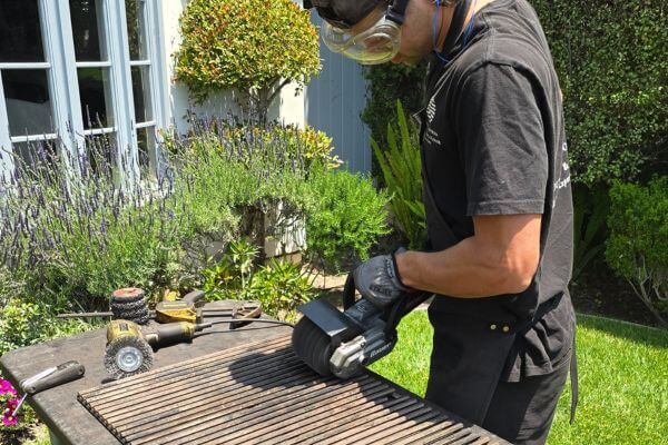grill grates being cleaned