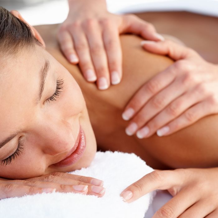 woman getting a massage, relaxed