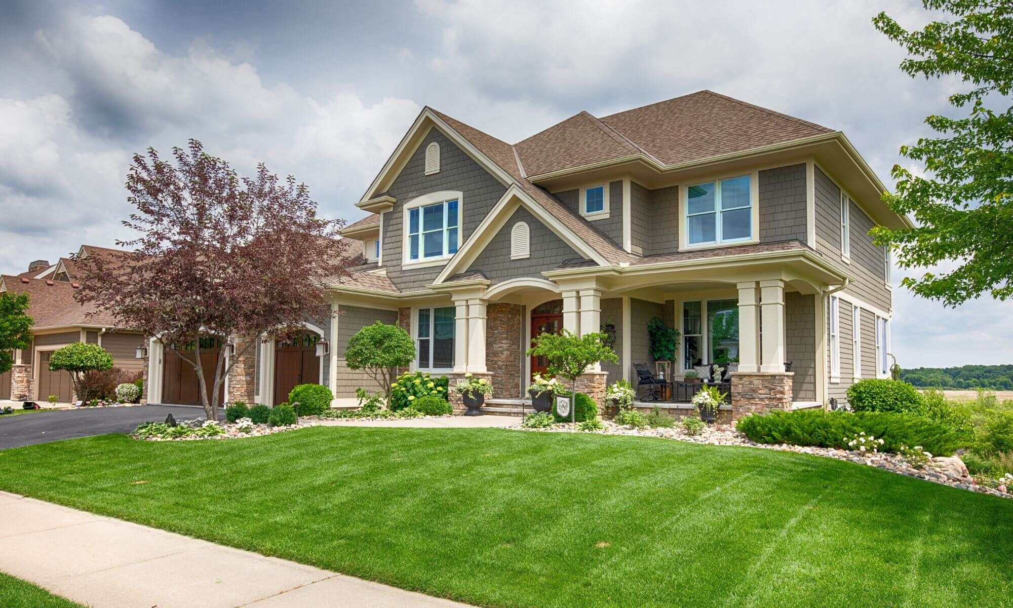 large house with green lawn