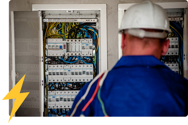 electrician working on a panel