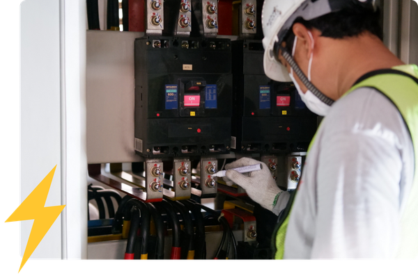 electrician working on an electric panel