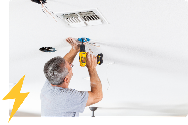 man installing a light