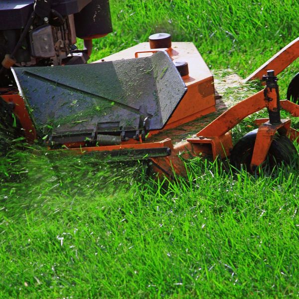 mowing grass