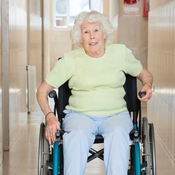 elderly woman in wheel chair