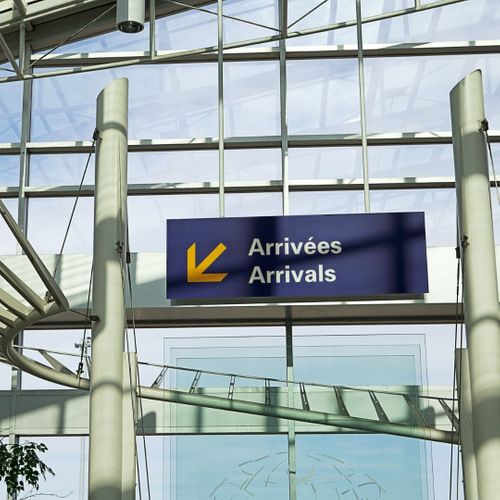 An arrivals sign at airport