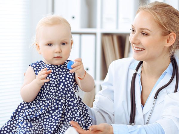 Image of a baby with a doctor