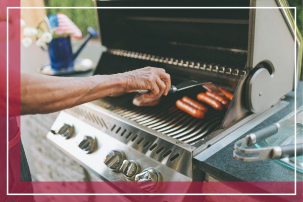 person grilling on bbq