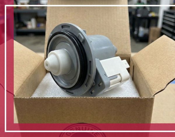 A new, genuine OEM dishwasher circulation pump sitting inside its open cardboard box.