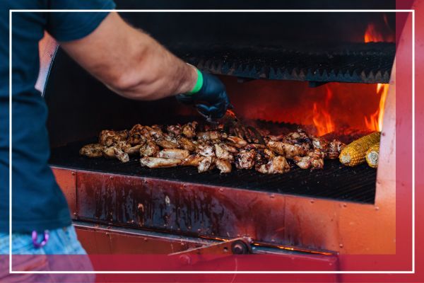 person using bbq grill