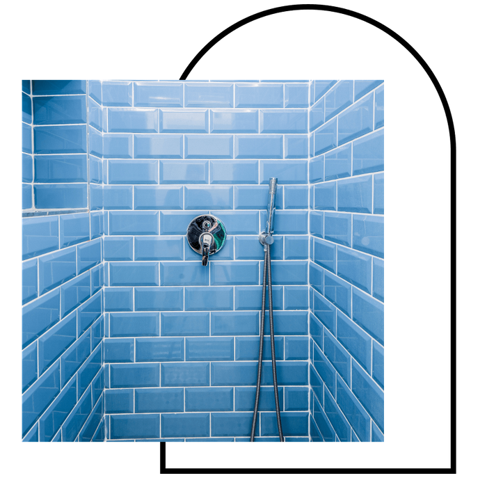blue subway tile in bathroom