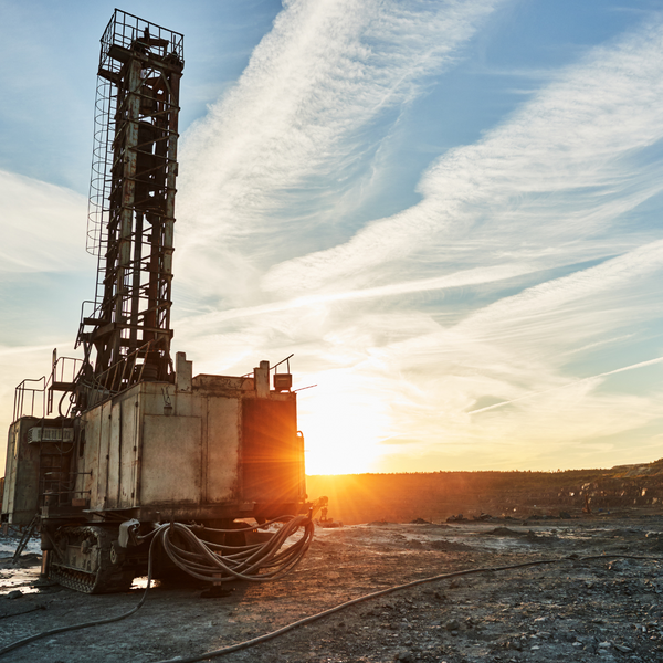 One rig with the sunset behind it