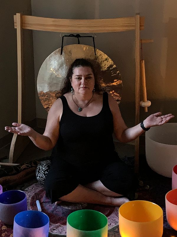 sound bath with gong and crystal bowls