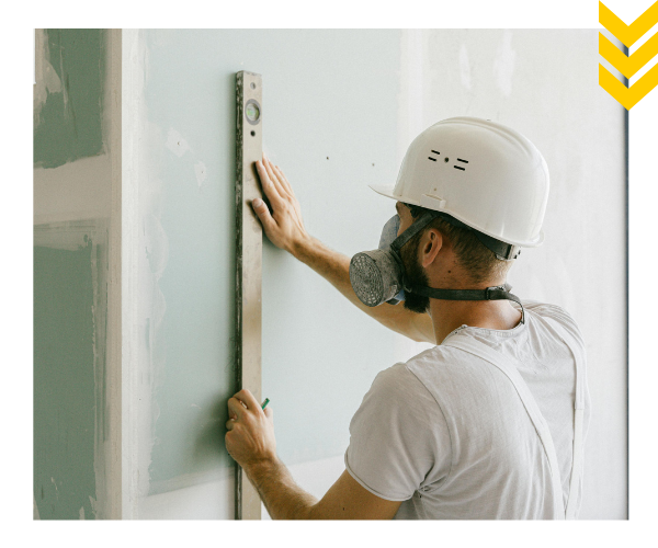 contractor working on drywall contractor working on drywall