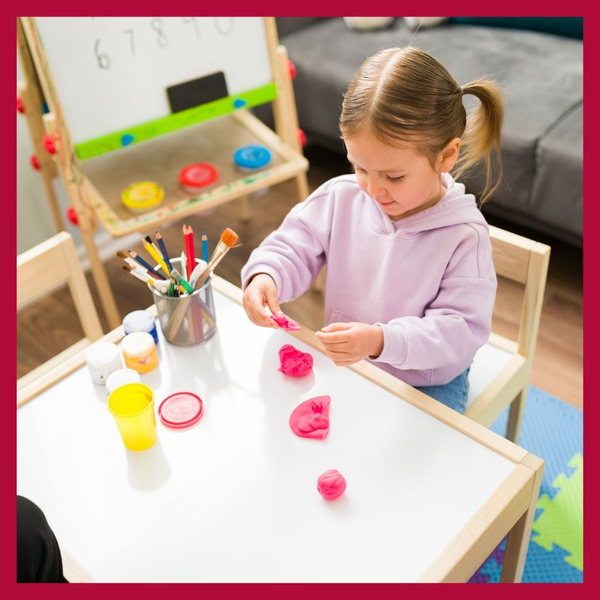 image of a child playing with dough