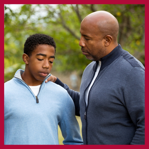 image of a father and son communicating