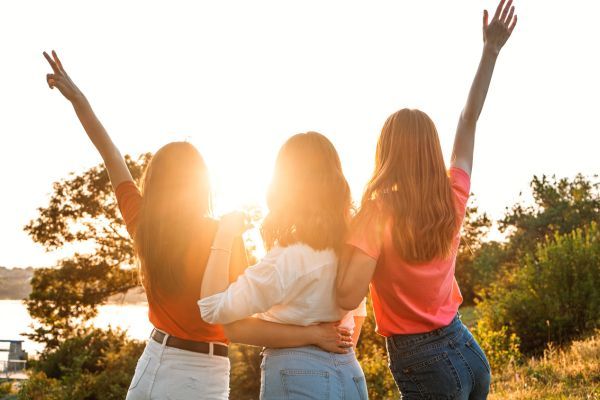 3 women facing away from camera