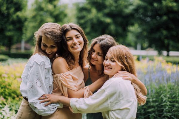4 women hugging