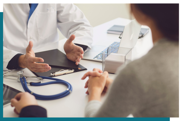 doctor talking with patient 