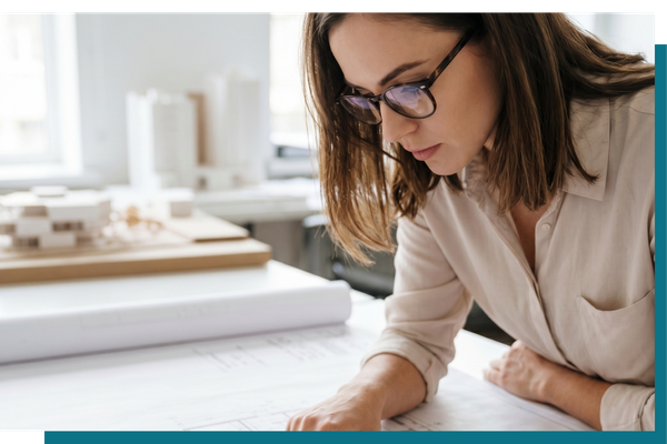 an architect meticulously reviewing a blueprint, visualizing the clarity and precision provided by diagnostic testing.