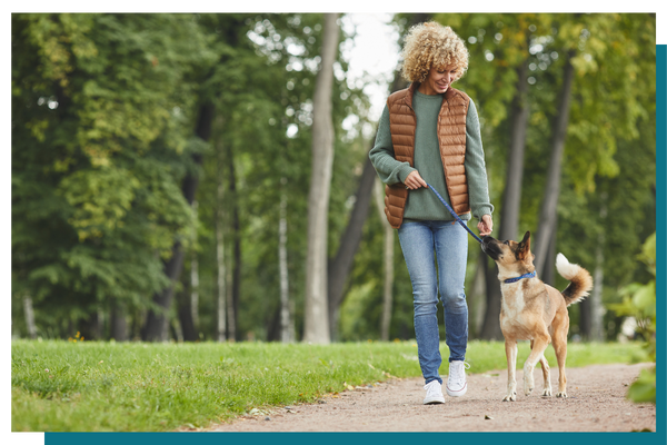 woman walking dog