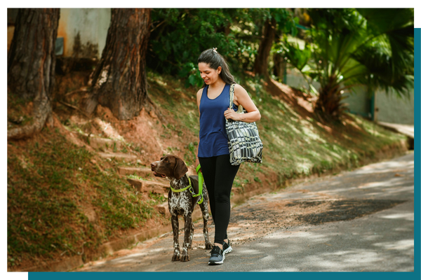 woman walking dog