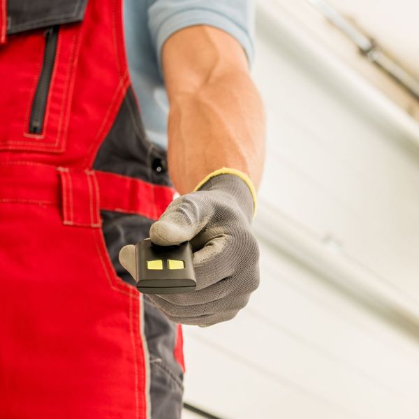 Contractor handing you garage clicker