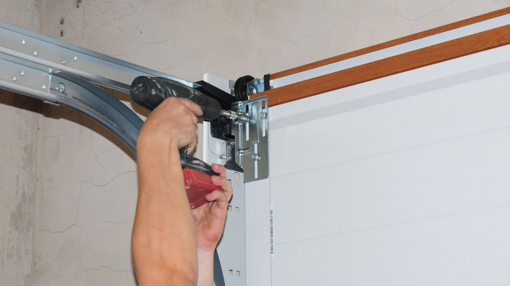 IsFixingGarageDoorSpringSimple-hero.jpg